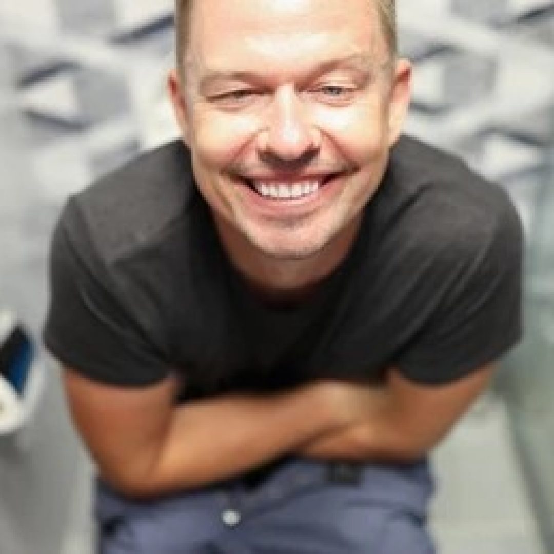 young-happy-man-sitting-on-260nw-2035554806.jpg